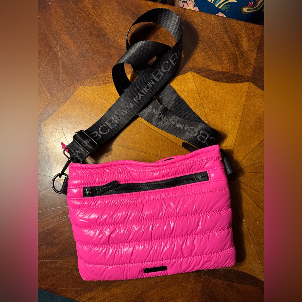 BCBGeneration Pink Puffer Crossbody bag
Hot pink adds a pop of color!